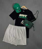 Kit NK com 1 camisa, 1 short, 1 boné e 1 bolsa